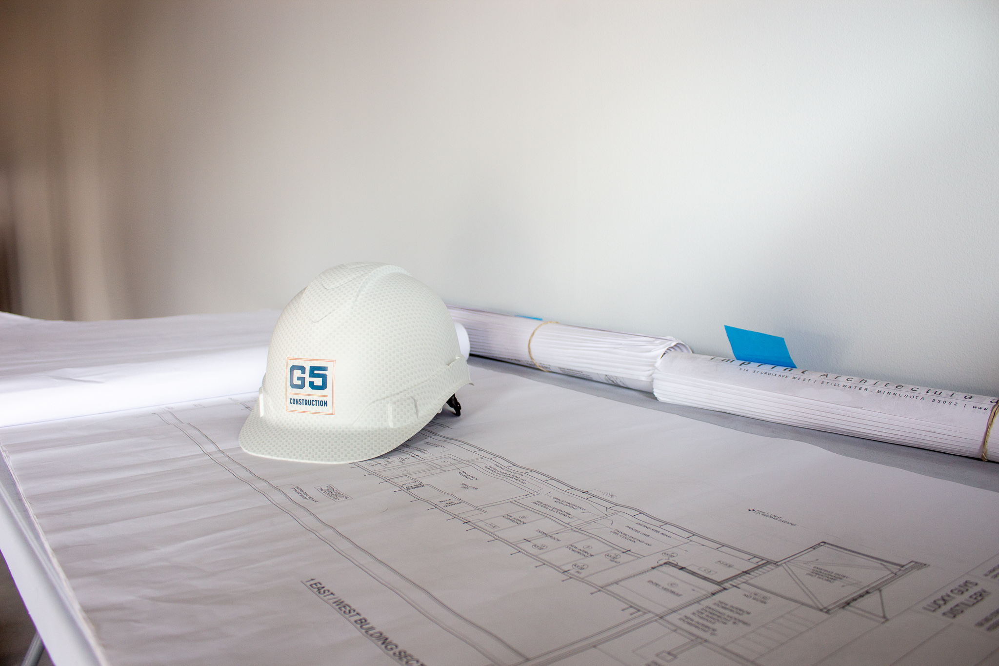 Hard Hat and Plans - G5 Construction